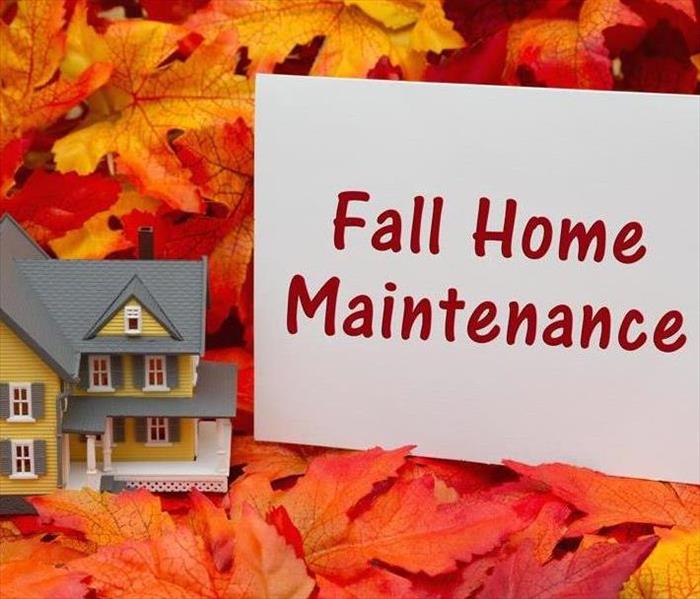 Fall leaves in red, yellow and orange with text: Fall Home Maintenance 