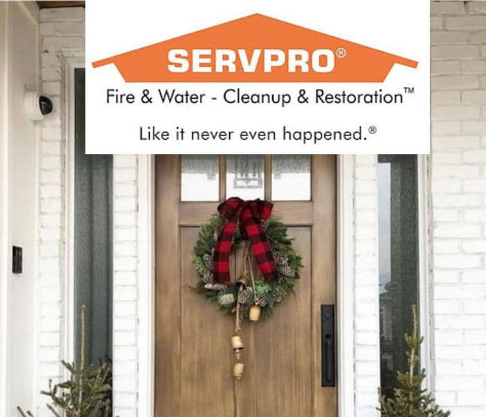 Holiday Cleaning - image of wreath on front door
